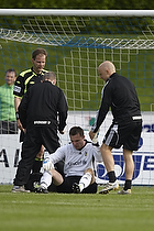 Stephan Andersen (Brndby IF) modtager behandling p banen