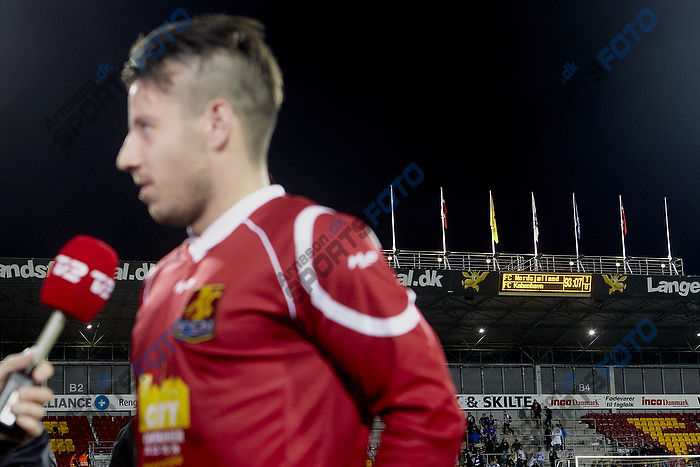 Matchvinder Mikkel Beckmann (FC Nordsjlland) med resultatet p mltavlen i baggrunden